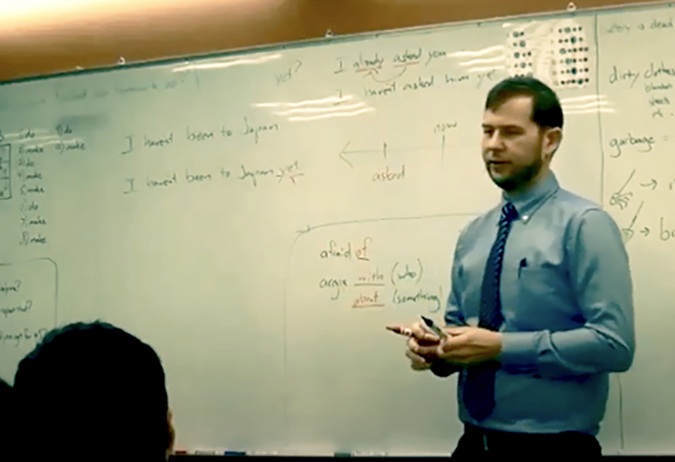 English Language Center instructor Eric Uphoff teaches a class