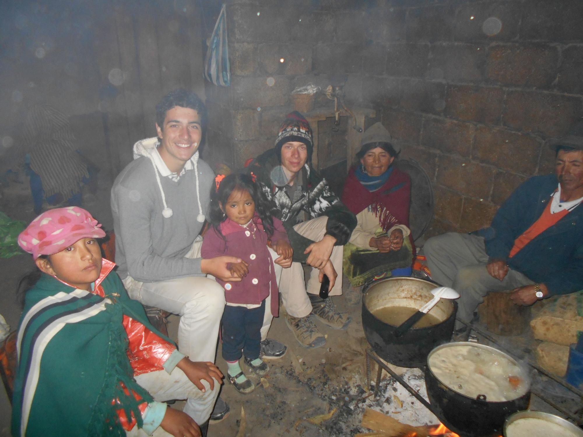 Cameron in Ecuador having dinner with friends
