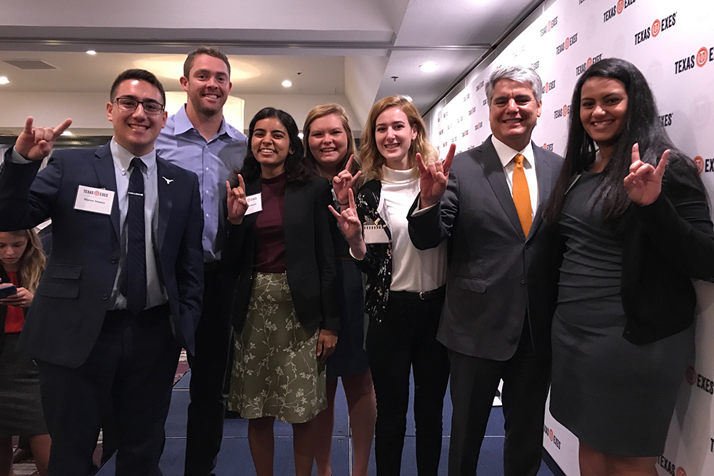 Diana with other students and president Fenves at a Texas Exes event
