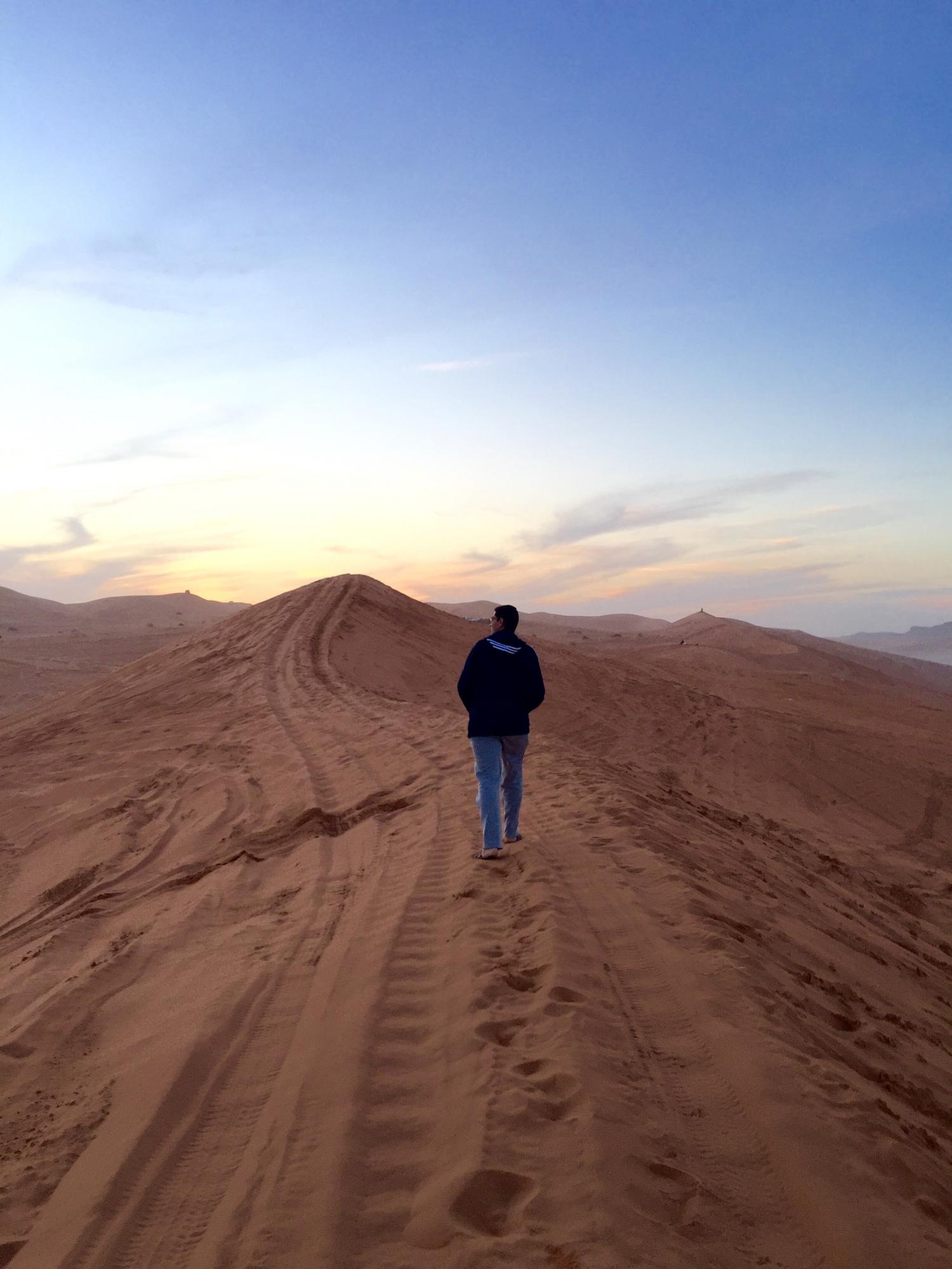 Abdullah walking in the desert