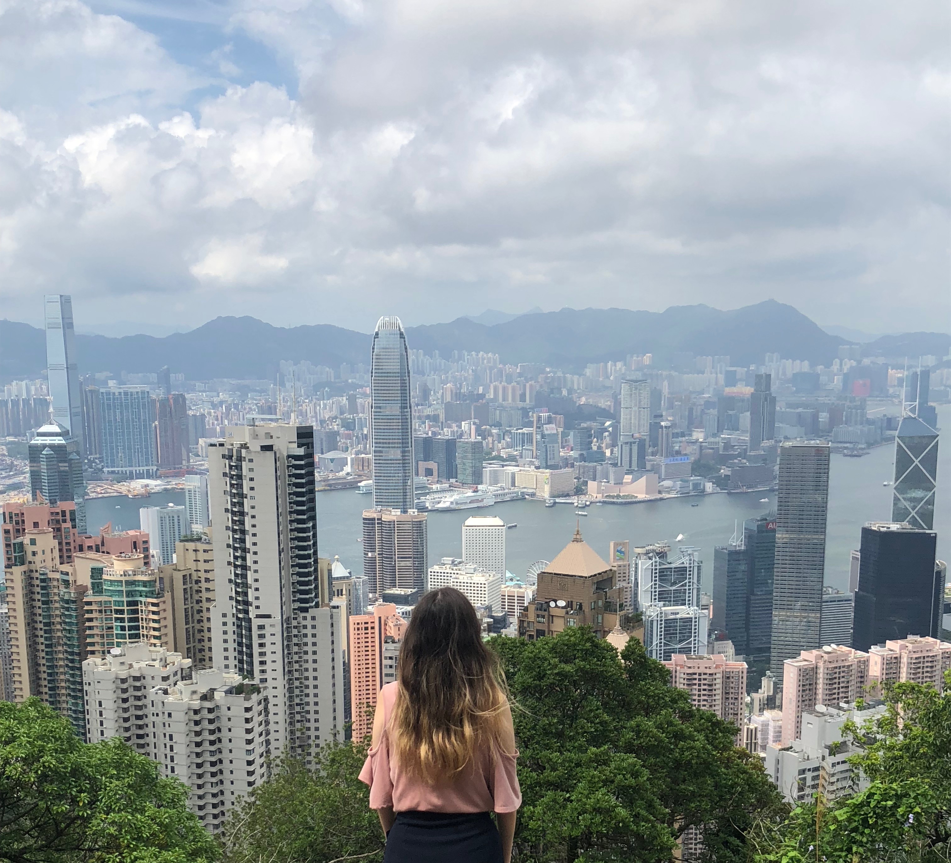 Saera looking over the skyscrapers in Hong Kong