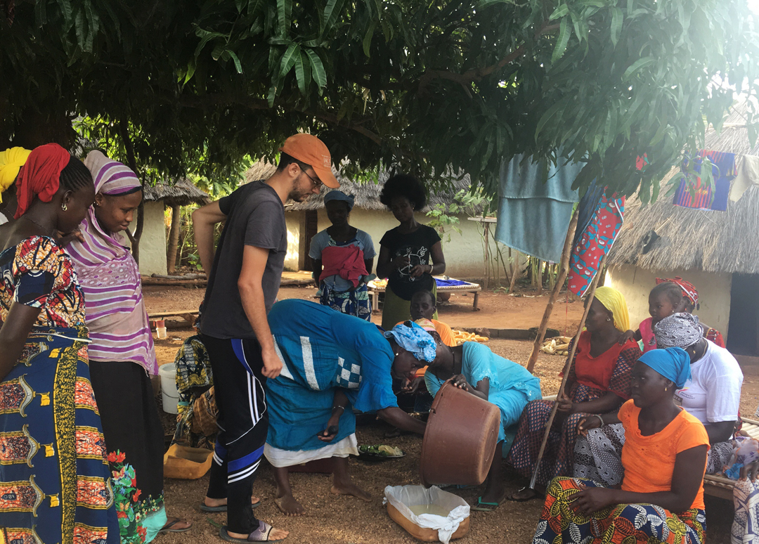 jeremy works with community members in senegal 