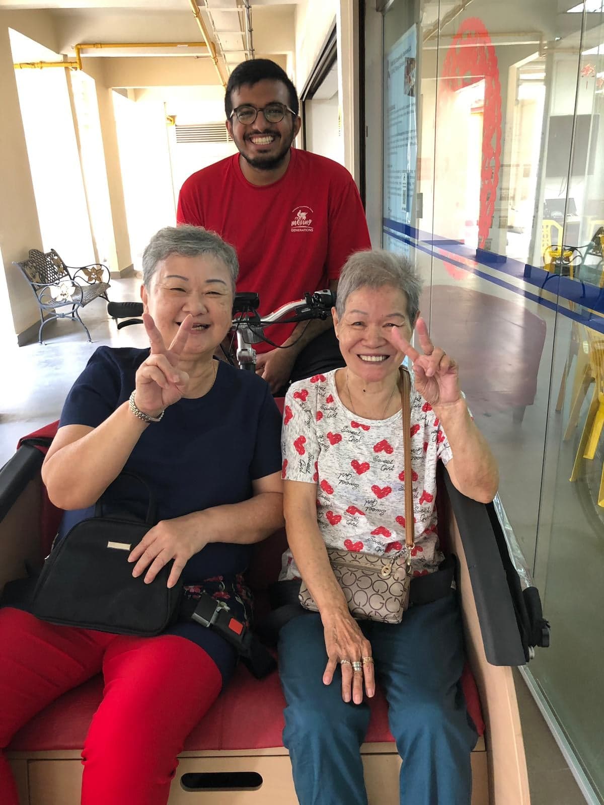 Avi volunteering at the Singapore chapter of Cycling Without Age