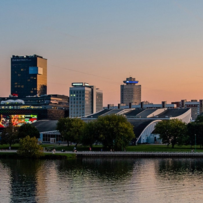 Belarus city by water and sunset