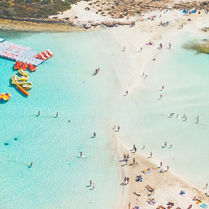 Bright blue water in Cyprus surrounded by land