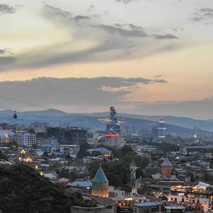Georgia building on mountain looking down on city in valley