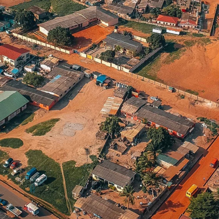 City in Ghana with red roads and flat roof houses