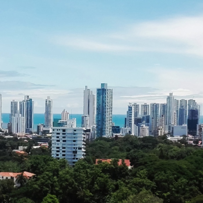 City in Panama with tall buildings and natural park in the center