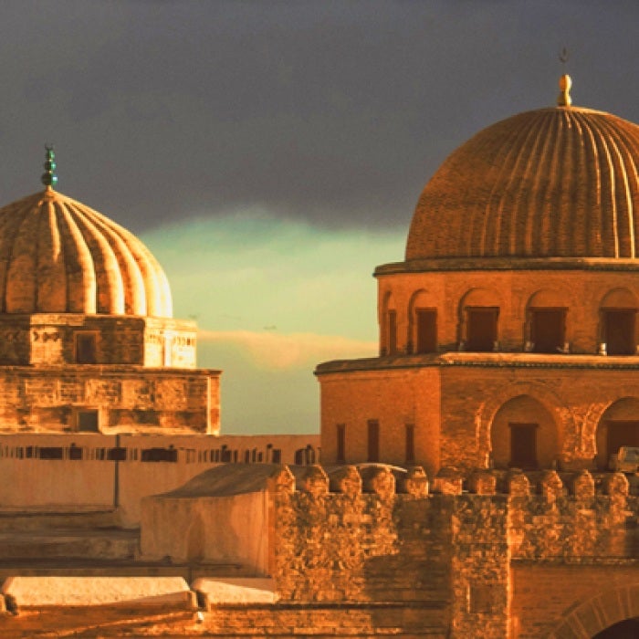 Tunisia Islamic architecture in orange sunlight