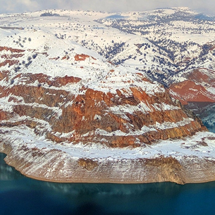 Snow and icy landscape in Uzbekistan surrounded by water