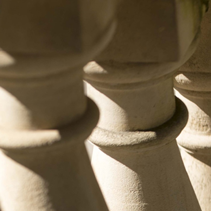 Cropped view of pillars on campus. 