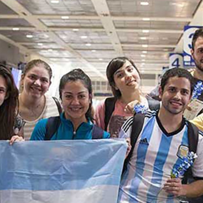 Group of Fulbright students from Argentina welcomed at the Austin airport.