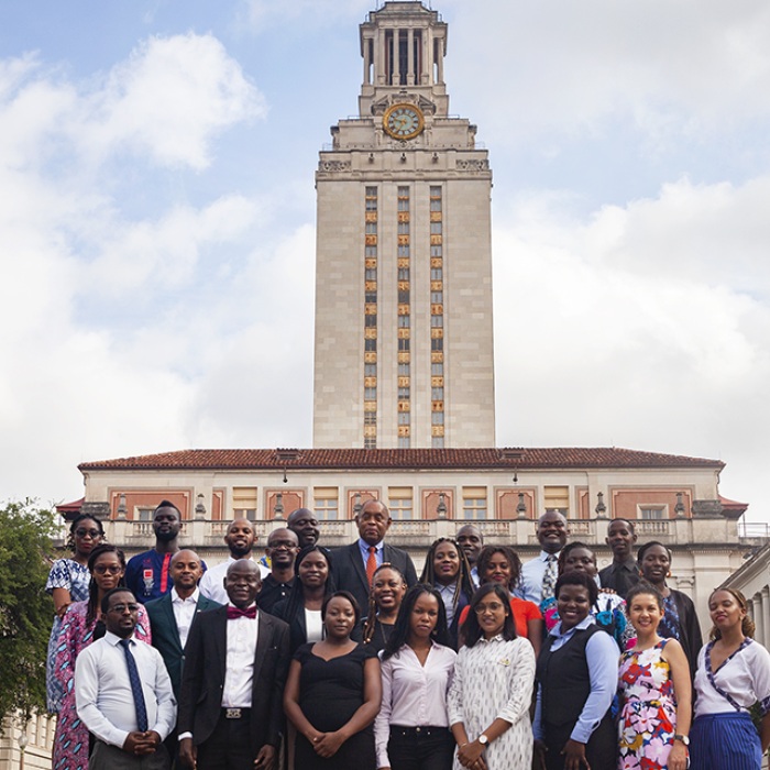 2019 Mandela Washington Fellows with Academic Director John Doggett in front of the UT Tower