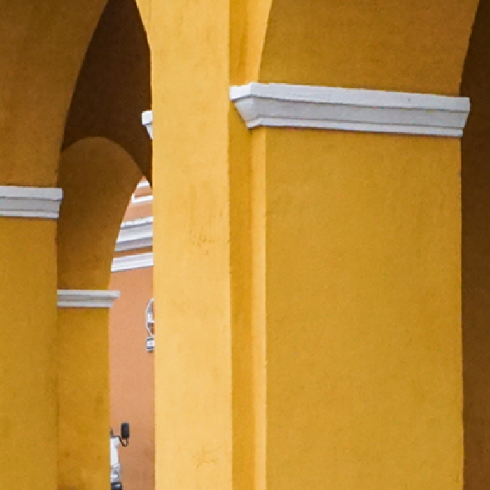 A close-up of yellow arches.