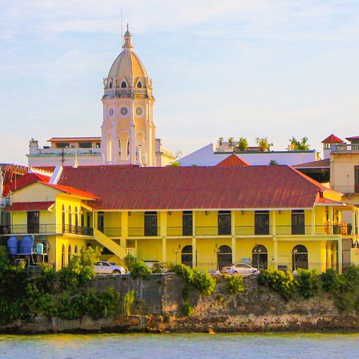 colourful buildings near body of water during daytime