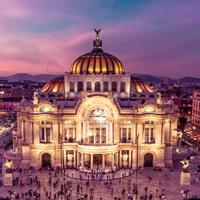 Palace of Fine Arts and plaza in Mexico City at sunset