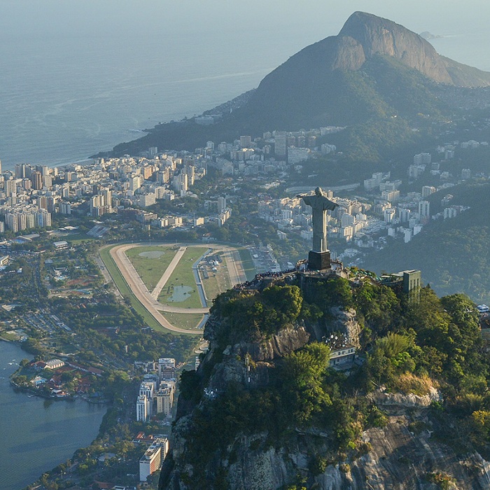 aerial view of brazil featuring a statue on a mountain 