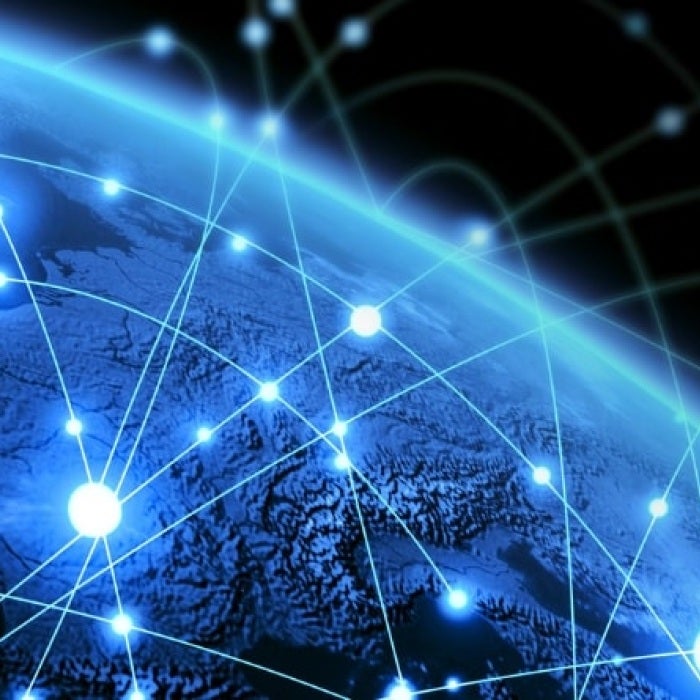 Digital representation of Earth, with illuminated blue features with black background