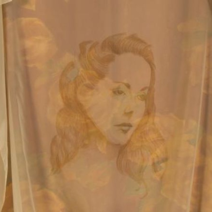Portrait of a women painted on transparent cloth with yellow roses in the background