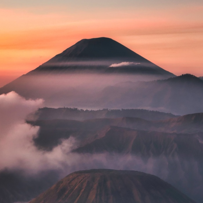 Volcanoes in Bromo Tengger Semeru National Park during a colorful sunrise in East Java, Indonesia