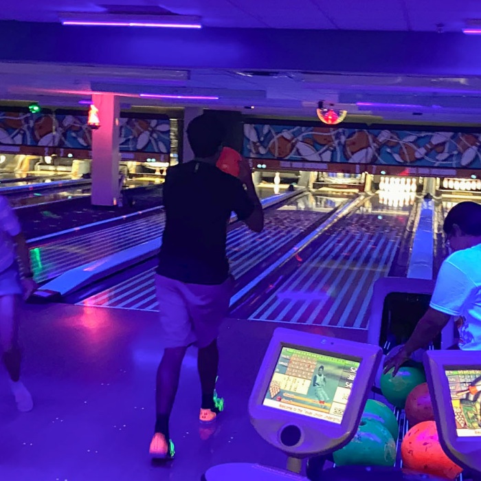 ISSS students enjoy themselves while glow bowling