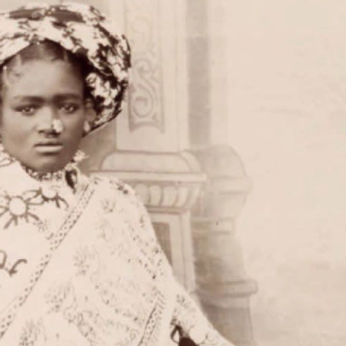 A Swahili women poses in this vintage portrait photo