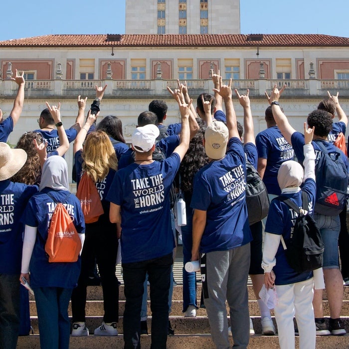 Iraqi Young Leaders show their longhorn pride in front of the UT Tower