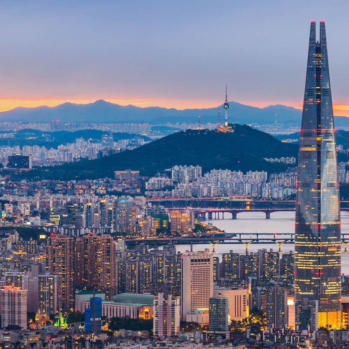 Seoul City skyline and downtown in the evening during the blue hour as seen from Namhansanseong mountain in South Korea