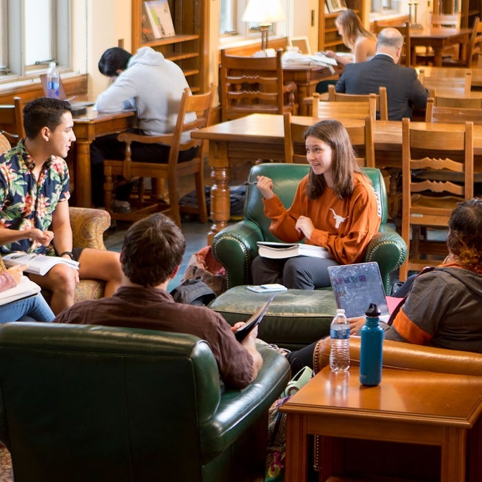Students gather and study together in a UT Austin library