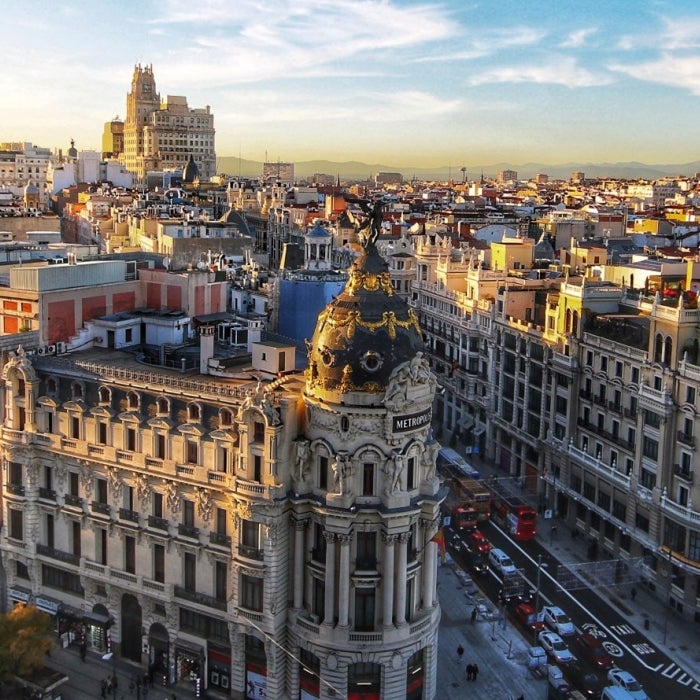 The famous street of Gran Via, surrounded by incredible architecture, shown during the day in Madrid, Spain.