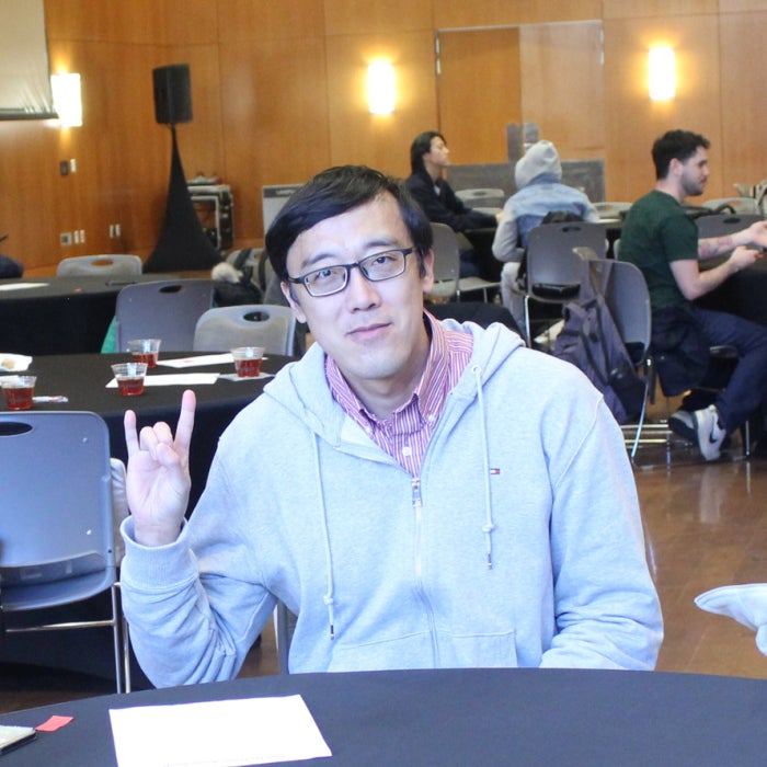 ELC students smiling and celebrating at final reception event