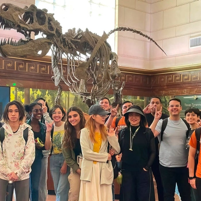  ELC students smile for a group photo whole touring the Texas Science and Natural History Museum