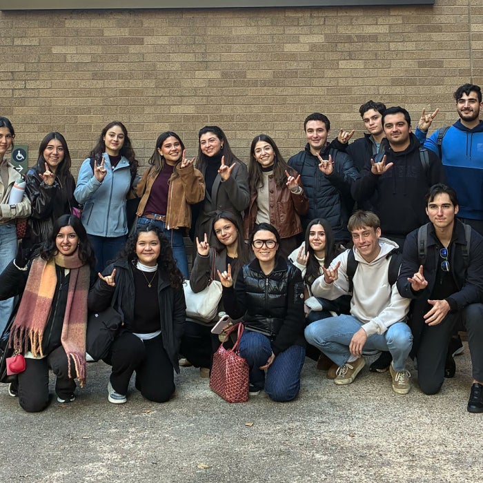 Undergraduate students from the Universidad de Monterrey (UDEM) in Mexico, pose for a group photo at the UT Austin Kendra Scott Center in Austin, Texas