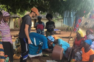 Photo of Jeremy Nicot helping out a community in Senegal
