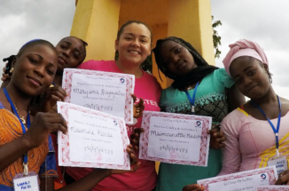Peace Corps volunteer Claudia Salazar poses with her students in Cameroon
