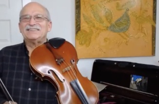 UT psychology professor Michael Domjan plays viola on YouTube