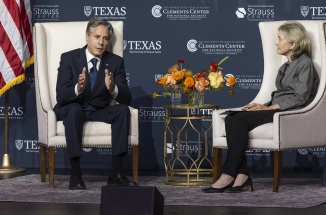 Secretary of State Antony Blinken converses onstage with Kay Bailey Hutchison