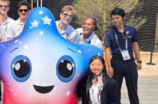 Youth Ambassadors at the Osaka World Expo 2025 pose with expo mascot