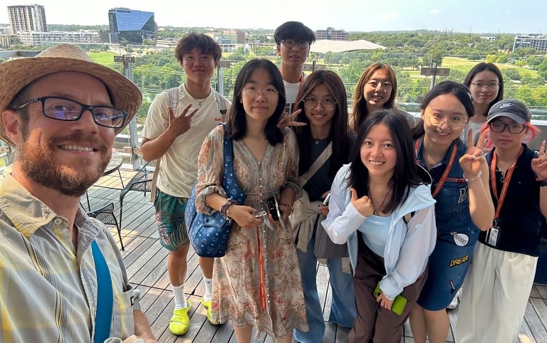 GSI students with instructor Will Slade on the roof of the Austin City Hall building