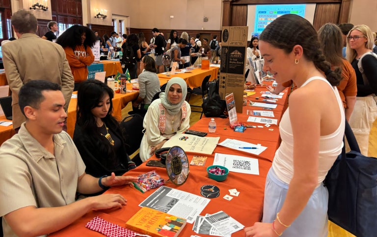 Faculty-led coordinators for program in Jordan engaging with student