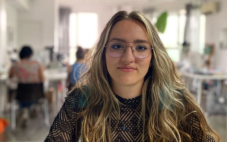 A female participant in the Absolute Internship program in Madrid, Spain smiles