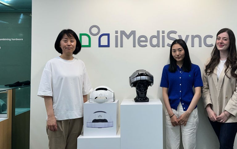 Participants with Absolute Internships smile at iMediaSync 