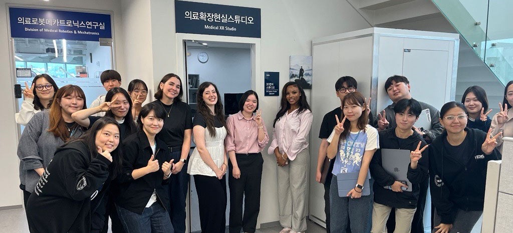 Seoul medical technology internship group smiles for a photo