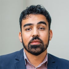 headshot of Luis