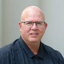 headshot of Mike