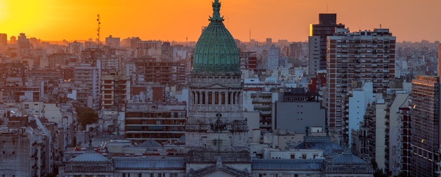 Argentinian city with sun in orange sky