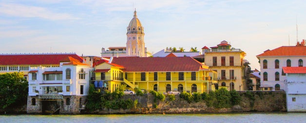 colourful buildings near body of water during daytime