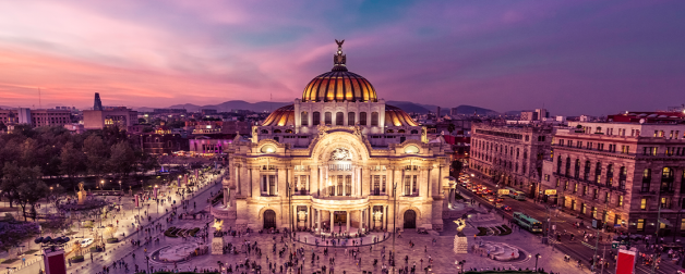 Palace of Fine Arts and plaza in Mexico City at sunset