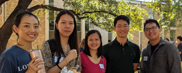 International students smiling. 