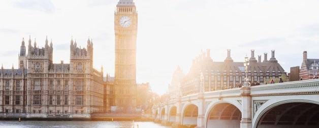 Looking over the river Thames with bridge to London, England and Big Ben clock tower in view